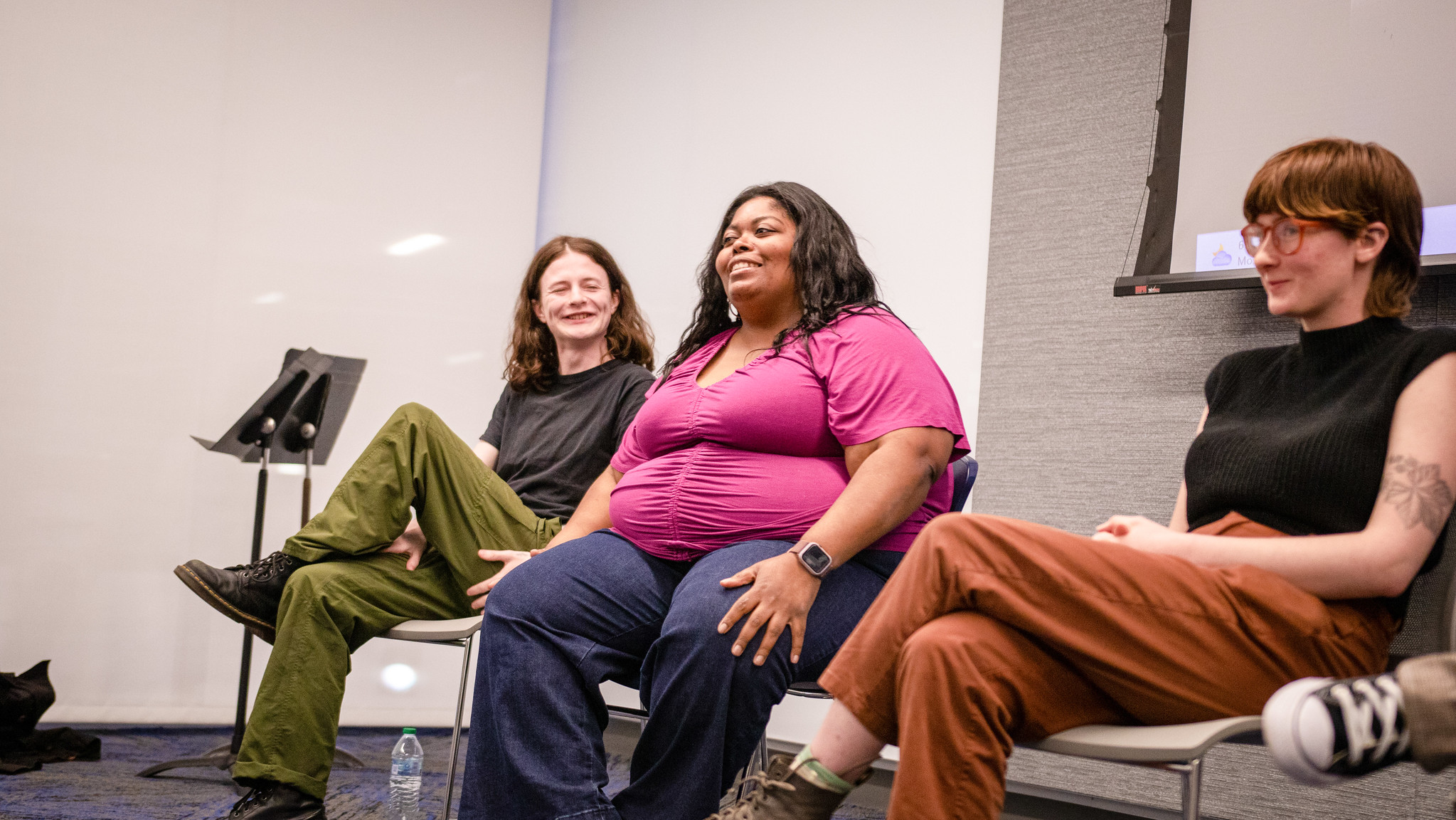 Young adults rehearsing together.