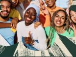 A diverse group of smiling young adults standing close together, expressing joy and unity. They are dressed in colorful clothing, with some making peace signs and one giving a thumbs-up. The background features an artistic green and beige sunburst pattern with circular photo cutouts.